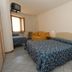 Albergo Umbria in Città di Castello: simple guest room with double bed, sofa, TV, and window light