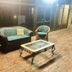 El Lago Waters Motel in The Entrance patio seating area with wicker chairs, loveseat and glass coffee table