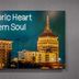 Homewood Suites by Hilton Fresno wall art with lit downtown Fresno buildings and the slogan 'Historic Heart Modern Soul'