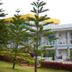 Breeze Hill Resort in Khao Kho with white balconies and landscaped gardens on a hillside