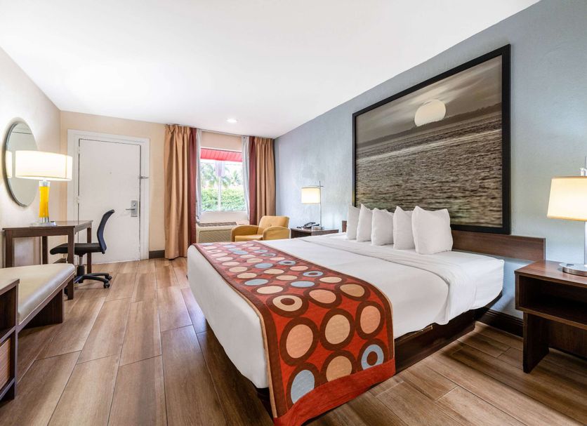 Super 8 by Wyndham Florida City/Gateway to Keys/Everglades room with king bed, desk and window