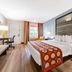 Super 8 by Wyndham Florida City/Gateway to Keys/Everglades room with king bed, desk and window
