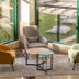 Holiday Inn Algarve Albufeira By IHG lounge with armchairs and poolside garden views in Albufeira