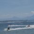 Tijili Hotel Benoa in South Kuta with jet skis on the ocean and distant mountain views