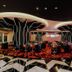 La Vela Saigon Hotel in Ho Chi Minh City casino-style lounge with black-and-white columns and patterned floor