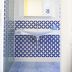 B&B Il Cavaliere in Santa Domenica bathroom with blue patterned tile, sink, mirror and shower
