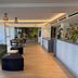 ibis Styles Ouistreham lobby with reception desk, seating area and wood flooring in Ouistreham
