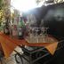 Albergo Michieletto in Montano Lucino with a wine and glass service cart in a dining area