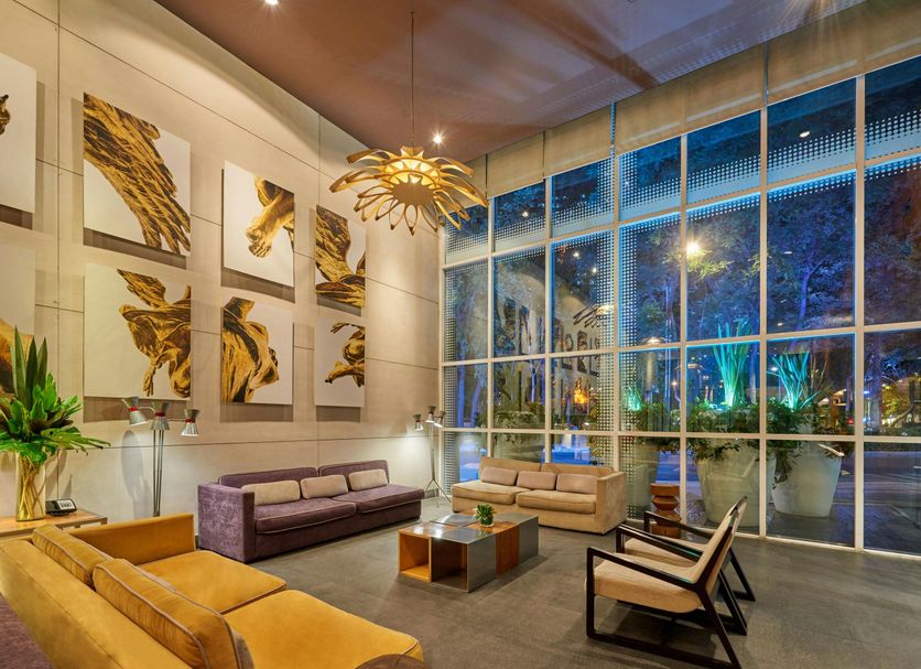 City Express Plus by Marriott Ciudad de México Reforma El Ángel lobby with floor-to-ceiling windows and seating