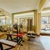 Fitness center at Buenos Aires Ezeiza Airport Marriott in Buenos Aires with weight benches and free weights