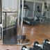 Royal Orchid Central Vadodara fitness center with treadmills, exercise bikes, and city view