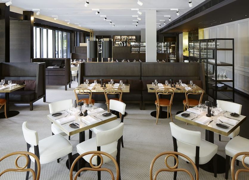 Little National Hotel Canberra restaurant with set dining tables and modern seating in Canberra