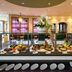 Mövenpick Hotel Egerkingen buffet display with assorted dishes and floral centerpiece in Egerkingen