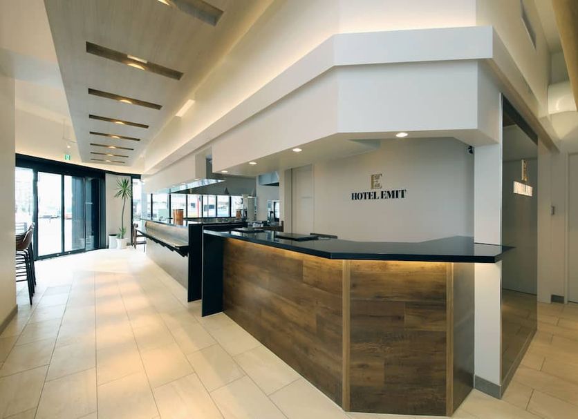 Hotel Emit Ueno in Tokyo lobby with reception desk and bright modern hallway