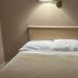 Bridgewater Hotel in Bridgewater room with double bed, bedside table and wall lamp