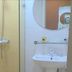 Home Inn Guiyang West Gate in Guiyang bathroom with shower, sink and mirror