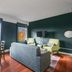 The Oxford at Pike Place Market Seattle room with sofa, dining table and city view windows