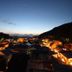 Suminoyu in Yamanouchi with a twilight town and mountain view