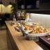 Hôtel L'Europe in Cholet breakfast buffet with pastries, bread, and tea station