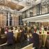 Hotel Grandhika Iskandarsyah Jakarta banquet hall with round tables, purple chairs and decorative chandeliers