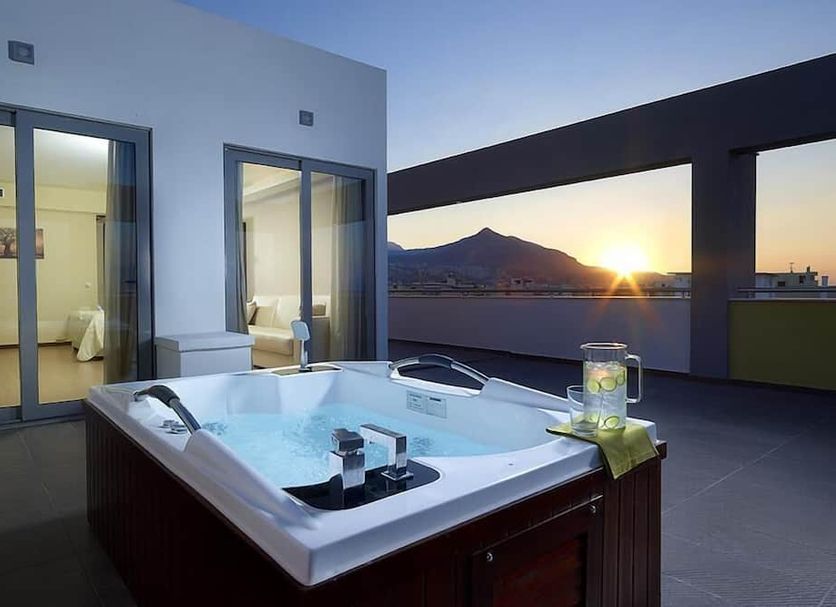 Arion Hotel, Xylókastro rooftop terrace with private hot tub and mountain sunset view