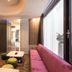 Voga Motel, Taichung City: modern lounge with pink sofa, low table and large window