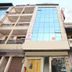Oyo 8959 New Dk Palace in Chandigarh, exterior with blue glass facade and balconies