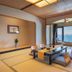 Imagine Hotel & Resort Hakodate tatami room with low table and ocean-view balcony