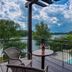 Tisza Balneum Hotel in Holló with balcony seating, pool view and lake scenery