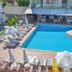 Clover Magic Altinkum Park Hotel in Side with outdoor pool, sun loungers, umbrellas and patio seating