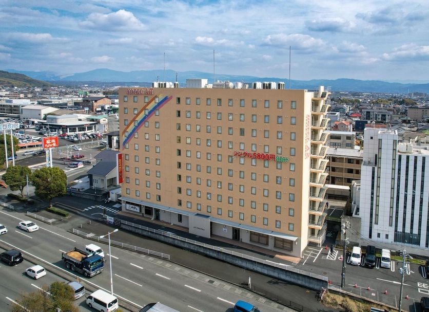 Kamenoi Hotel Kumamoto Inter Goryo exterior in Kumamoto with city and mountain views