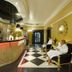 Hotel Royal Baltic 4 Luxury Boutique in Ustka lobby with reception desk and guests seated in ornate chairs