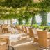 Hotel & Spa Der Steirerhof in Bad Waltersdorf with outdoor dining terrace and sea view