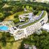 Pulse Grande Hotel, Putrajaya aerial view with outdoor pool and lush green surroundings