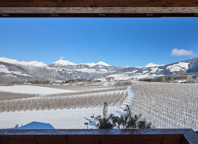 Mineralienhotel Natznerhof in Natz-Schabs with snowy vineyard valley and mountain views