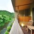 Yusen Shidate balcony overlooking a lush river valley in Hanamaki