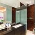 Downtown Villas in Kuta bathroom with glass shower, sink vanity and open closet