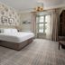 The Waterhead Inn, Ambleside bedroom with king bed, window view and plaid carpet