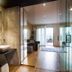 Hotel Ristorante La Rosina in Marostica: modern bathroom vanity with vessel sink and glass doors to bedroom
