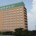 Hotel Route-Inn Koriyama Inter in Kōriyama, a mid-rise hotel building with rows of windows
