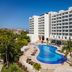 Fiesta Americana Riviera Nayarit in Nuevo Vallarta with lagoon-style pool and palm trees