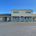 Red Carpet Inn & Suites Morgantown exterior with single-story motel rooms and central entrance