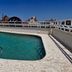 Amérian Executive Córdoba rooftop pool with city views in Cordoba