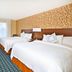 Fairfield Inn & Suites by Marriott Madison West/Middleton in Middleton room with two beds, desk and TV