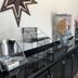 Hotel Piney Woods Huntsville breakfast area with cereal dispenser and coffee station