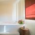 Palette Bangkok Natural Resort and Spa in Bangkok with a bright spa bathtub and flowers