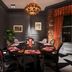 Dining room at Cairn Hotel Newcastle Jesmond in Newcastle upon Tyne with a set table and chandelier
