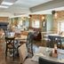 The Bluebird Inn at Samlesbury in Blackburn, cozy restaurant with stone walls, wood tables and fireplace