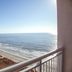 Ocean-view balcony at Towers at North Myrtle Beach overlooking the beach and shoreline