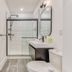 Sosuite at French Quarters - Rittenhouse Square bathroom in Philadelphia with walk-in shower and vanity